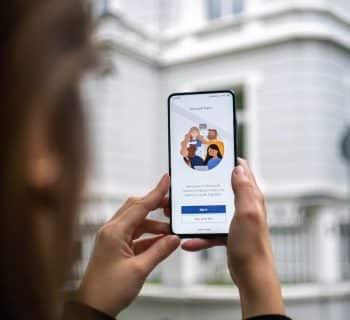 person holding white android smartphone