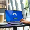 person using black laptop computer