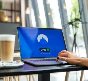 person using black laptop computer