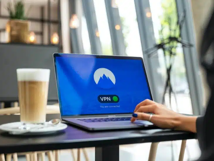person using black laptop computer